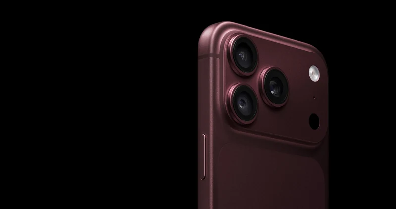 Close-up of the three rear camera lenses on a Burgundy iPhone 18 Pro